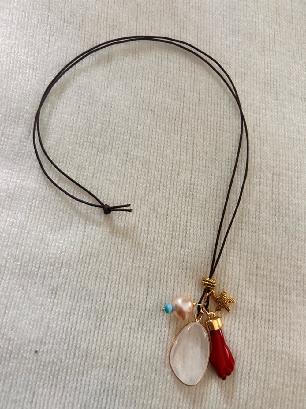 Boho Necklace with Sea Inspired Charms and Clear Quartz Pendant